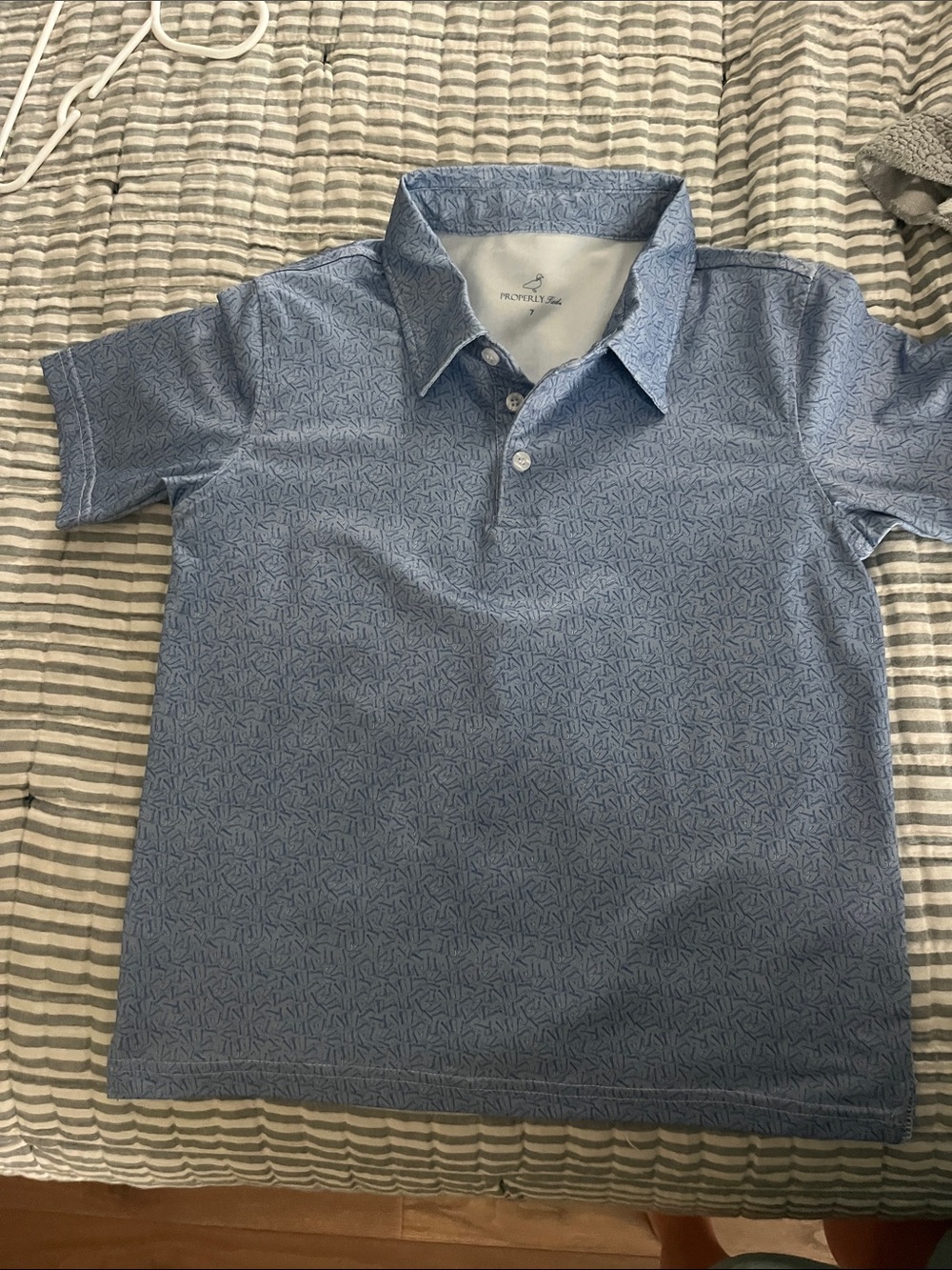 Boys Properly Tied blue performance polo with fishing hook print 🎣